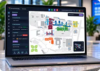 A laptop showing one client map open in its own portal